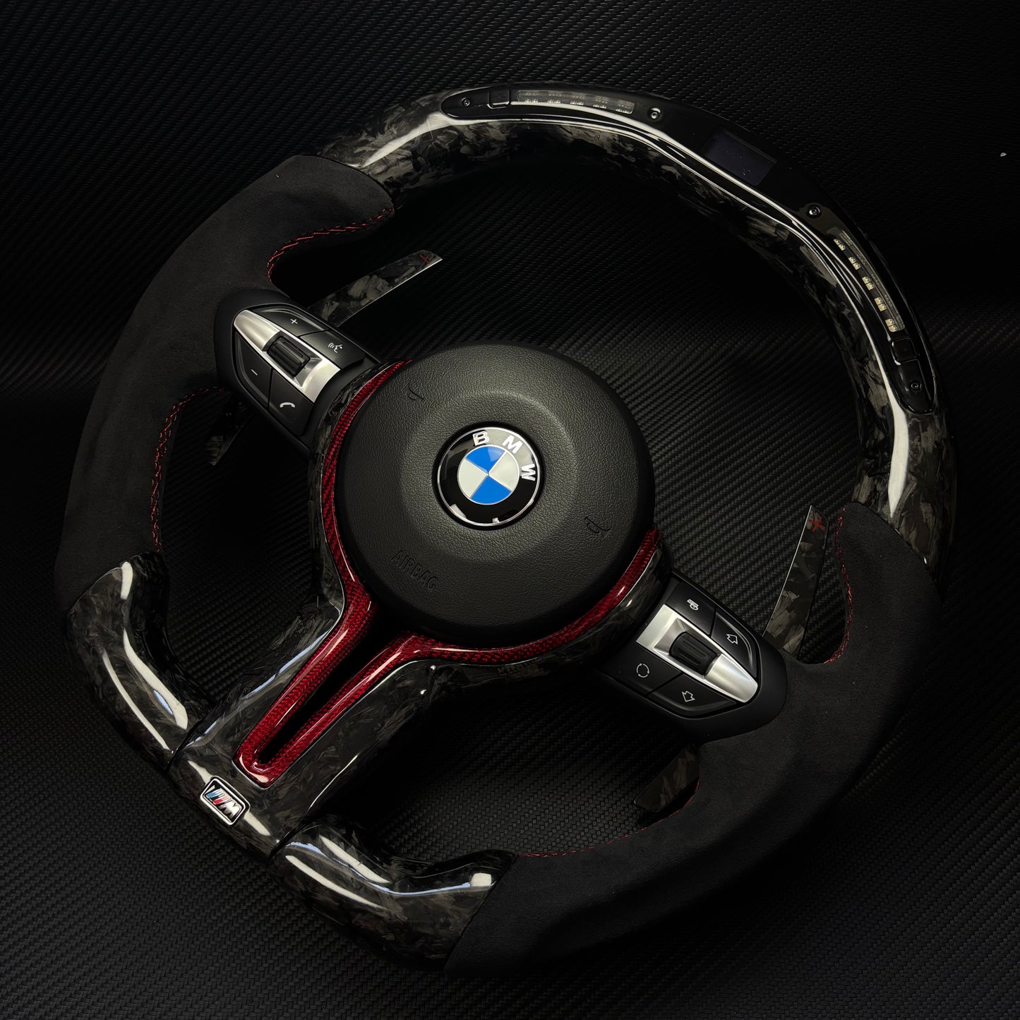 The red foil carbon fiber AUTO steering wheel is suitable for BMW E90 E91 E92 E93 E70 E71 E72 E53 F10 F30 F21 F22 F46 F30 F35 M3
